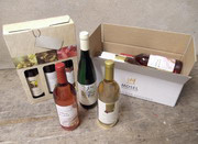 When selling wine at the wine estate, we pack bottles in reusable cardboard boxes or smaller gift boxes for two or three bottles with viewing window.